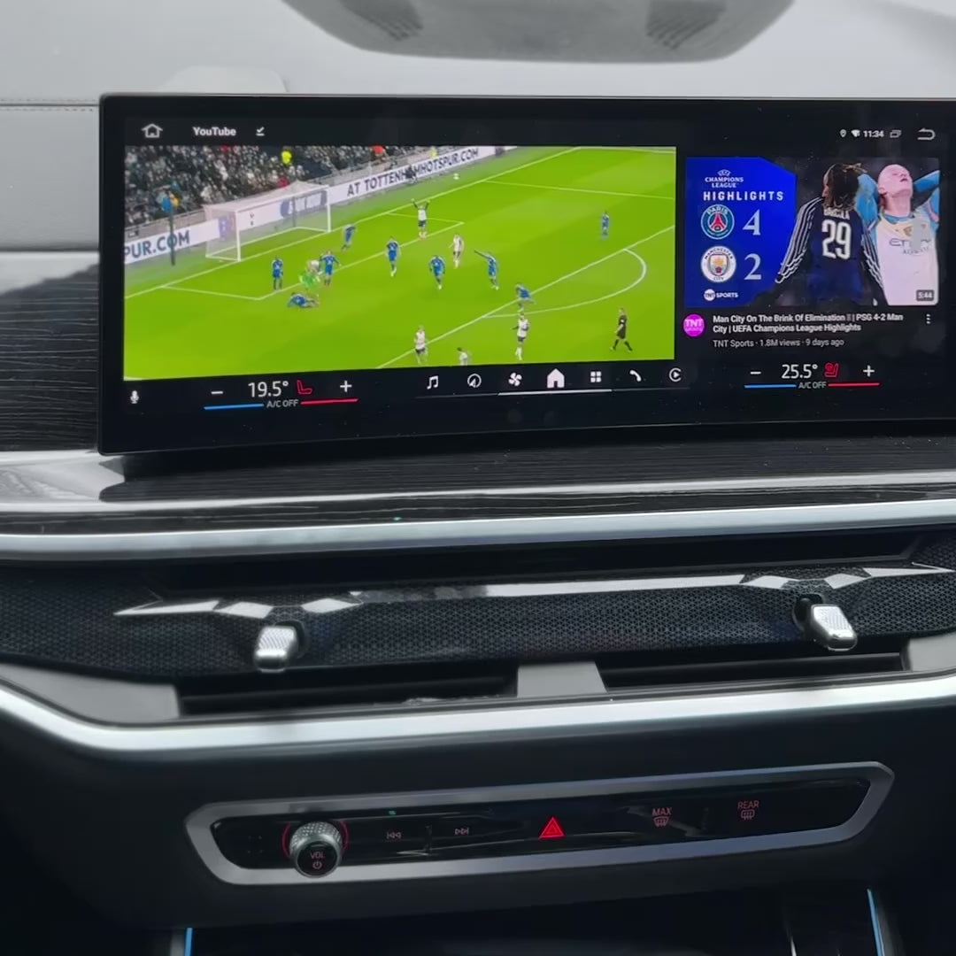 Video demonstration of the BMW VMC Multimedia Box in a BMW, streaming football highlights from YouTube on the car’s iDrive screen.